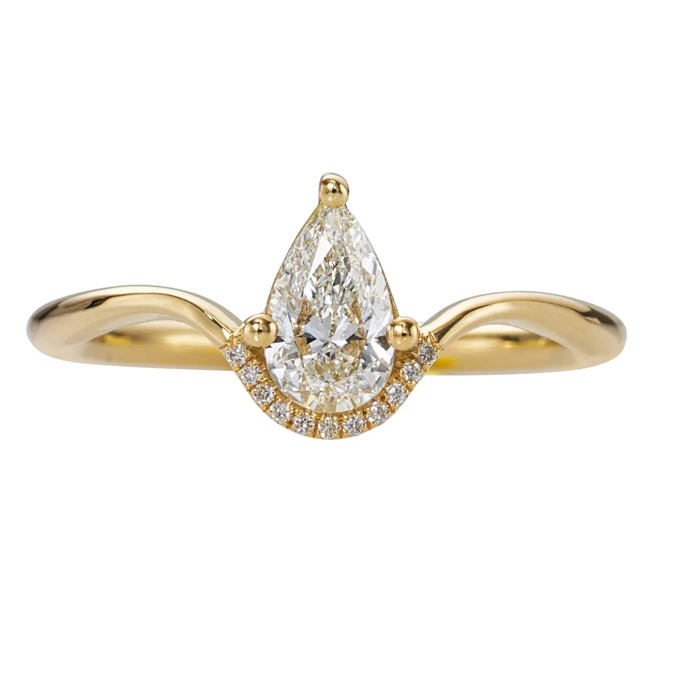 Floating Pear Cut Diamond Engagement Ring in a Classic Style