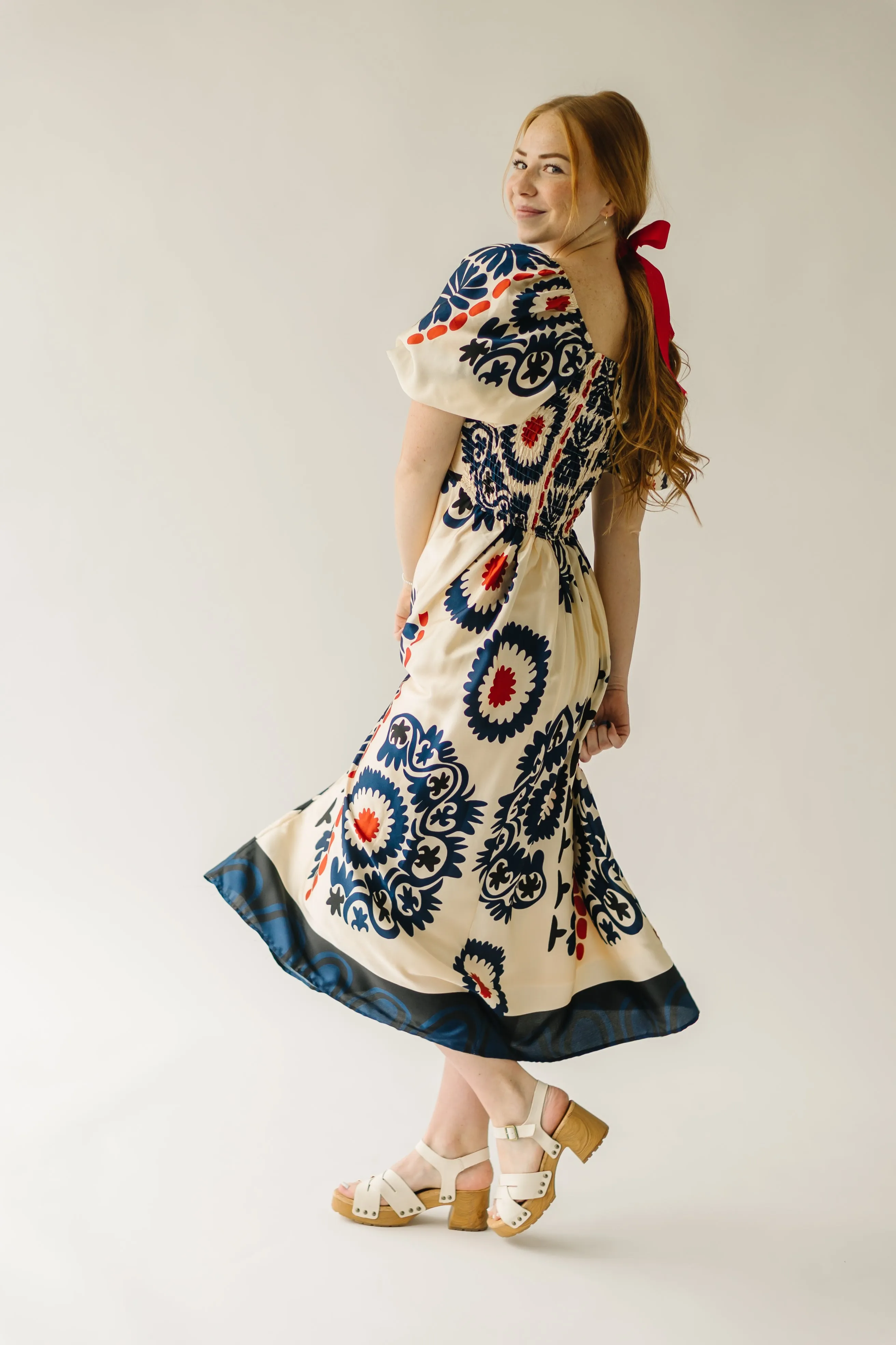 The Armada Puff Sleeve Satin Midi Dress in Navy Multi