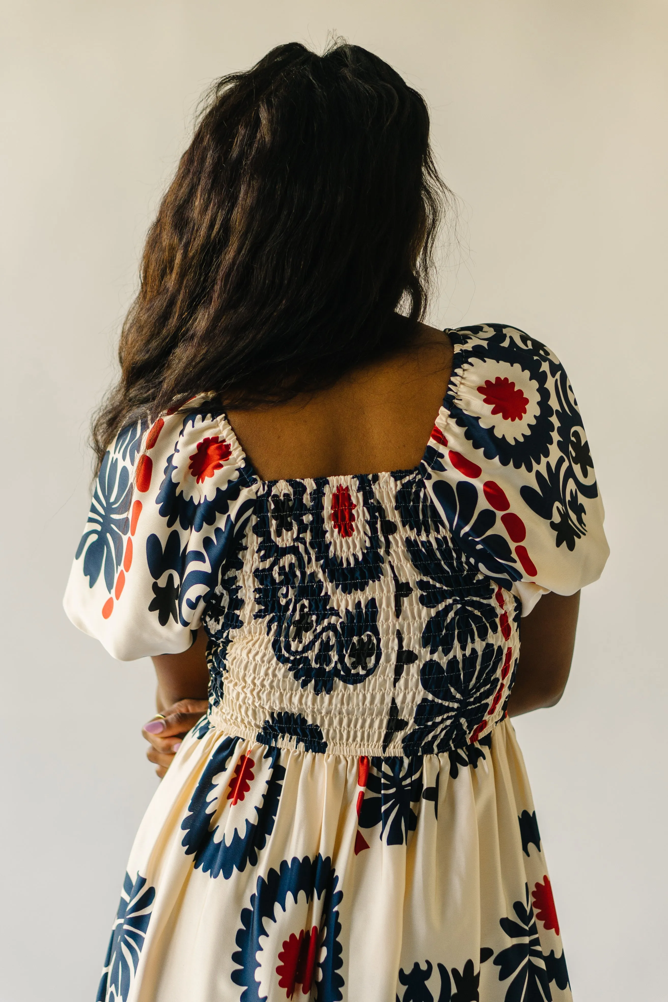 The Armada Puff Sleeve Satin Midi Dress in Navy Multi